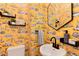 Unique powder room with bright yellow wallpaper featuring New York City monuments and sleek, modern fixtures at 121 N Marion St, Denver, CO 80218