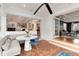 Open dining area showcasing a custom banquette, modern table, and access to other living spaces at 121 N Marion St, Denver, CO 80218