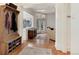 Inviting foyer with hardwood floors, mudroom-style storage, and views of the living room at 121 N Marion St, Denver, CO 80218