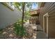 Private backyard featuring a patio, stone landscaping, and a charming two-story deck at 11150 Night Heron Dr, Parker, CO 80134