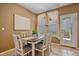 Charming dining room with tile floors, perfect for Gathering meals and gatherings at 11150 Night Heron Dr, Parker, CO 80134