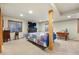 A bedroom featuring a comfortable bed, TV, and windows offering natural light creating a relaxing space at 551 Rio Rancho Way, Brighton, CO 80601