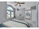 Main bedroom with vaulted ceiling, ensuite bathroom and ceiling fan at 18576 E Saratoga Pl, Aurora, CO 80015