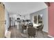 Open concept kitchen with island and breakfast bar; view to dining area at 18576 E Saratoga Pl, Aurora, CO 80015