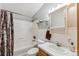 This bathroom includes a shower/tub, a white toilet and sink, and ample storage at 764 Blue Ridge Rd, Breckenridge, CO 80424