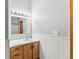 Bathroom featuring a sink and vanity with mirror, and wainscotting at 764 Blue Ridge Rd, Breckenridge, CO 80424