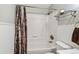 Bathroom displaying tub-shower combo with curtain and chrome fixtures and fittings at 764 Blue Ridge Rd, Breckenridge, CO 80424