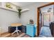 Charming breakfast nook with a blue coffee bar and floating plant shelves at 764 Blue Ridge Rd, Breckenridge, CO 80424