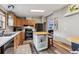 Spacious kitchen featuring an island, wood cabinets, modern appliances, and an inviting atmosphere at 764 Blue Ridge Rd, Breckenridge, CO 80424