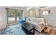 Comfortable living room with natural light, blue accents, and cozy seating arrangements at 764 Blue Ridge Rd, Breckenridge, CO 80424