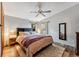 Spacious bedroom featuring hardwood floors, large bed, and modern ceiling fan at 764 Blue Ridge Rd, Breckenridge, CO 80424