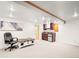 Finished basement featuring a kitchenette and an entertainment area at 4550 S Fox St, Englewood, CO 80110
