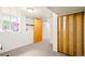 Basement interior with carpet flooring, window and shelving nook at 4550 S Fox St, Englewood, CO 80110