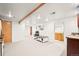 Finished basement including a bathroom, kitchenette, and flexible open space at 4550 S Fox St, Englewood, CO 80110