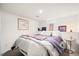 Cozy basement bedroom with carpet, a small window, and soft lighting at 4550 S Fox St, Englewood, CO 80110