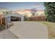 Long driveway leading to a detached garage and charming brick home at 4550 S Fox St, Englewood, CO 80110