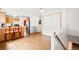 Open floor plan combines the kitchen with the breakfast nook and stairs at 4550 S Fox St, Englewood, CO 80110