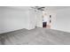 Expansive bedroom with carpet, ceiling fan, and ensuite bathroom featuring a vanity at 5199 Arbutus St, Arvada, CO 80002