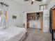 Charming bedroom featuring neutral walls, built-in closet, and soft natural light from an adjacent window at 4786 Forest Hill Rd, Evergreen, CO 80439