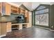 Spacious office with built in cabinets and a large window providing natural light at 5311 S Danube Ct, Centennial, CO 80015