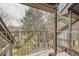 Relaxing outdoor balcony with views of lush landscaping and neighboring buildings at 814 S Vance St # F, Lakewood, CO 80226