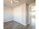 Bedroom with a sliding closet door and trim throughout at 6671 Oneida St, Commerce City, CO 80022