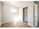 Bedroom with closet featuring custom shelving, plus a bright window at 6671 Oneida St, Commerce City, CO 80022