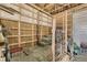 View of the barn's interior, showcasing the wooden structure and potential storage areas at 11549 Haskell Creek Rd, Larkspur, CO 80118