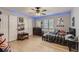 Bedroom with hardwood floors, ceiling fan, and closet storage at 11549 Haskell Creek Rd, Larkspur, CO 80118