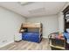 A cozy room with bunkbeds, providing a compact and functional layout at 11549 Haskell Creek Rd, Larkspur, CO 80118