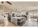 Modern kitchen boasts an island, stainless steel appliances, and a seamless design at 11549 Haskell Creek Rd, Larkspur, CO 80118