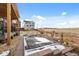 View of a spacious backyard area with a patio and fenced-in yard, perfect for outdoor entertaining and relaxation at 15271 Grasslands Dr, Parker, CO 80134