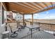 Outdoor patio area with comfortable seating and overhead pergola; ideal for outdoor dining and relaxation at 15271 Grasslands Dr, Parker, CO 80134