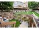 Backyard with fenced lawn and patio space for outdoor enjoyment at 1699 S Trenton St # 69, Denver, CO 80231
