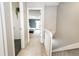 Upstairs hallway leading to bedroom and bathroom at 1699 S Trenton St # 69, Denver, CO 80231