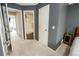 Hallway view shows access to a bathroom and bedroom at 1699 S Trenton St # 69, Denver, CO 80231