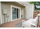 Charming patio space with comfortable seating and a sliding glass door entrance at 1699 S Trenton St # 69, Denver, CO 80231