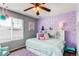 bedroom with colorful wall accents and patterns, with lots of shelf space at 463 Mazzini St, Erie, CO 80516
