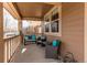 Comfortable front porch featuring ample seating and a welcoming atmosphere at 463 Mazzini St, Erie, CO 80516