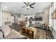 Inviting living room featuring an open layout, stylish furnishings, and a modern ceiling fan, perfect for relaxation at 6599 Pecos St, Denver, CO 80221