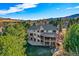 Beautiful backyard of the home highlighting a two-story deck and walk out basement at 9 Mule Deer Trl, Littleton, CO 80127