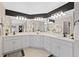 Elegant bathroom showcasing double sinks, quartz countertops, and modern fixtures at 9 Mule Deer Trl, Littleton, CO 80127