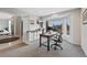 Well-lit office space with bay window and built-in storage, perfect for remote work at 9 Mule Deer Trl, Littleton, CO 80127