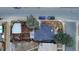 Aerial view of a residential property showcasing the roof, yard, and nearby streets at 3701 S Grant St, Englewood, CO 80113
