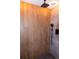 Contemporary shower featuring wood-look tile, modern fixtures, and a rainfall showerhead at 3701 S Grant St, Englewood, CO 80113