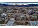 Stunning aerial view of the house, highlighting its charming architecture and manicured surroundings at 9521 Garnett Way, Arvada, CO 80007