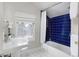 Updated bathroom with subway tile shower and white vanity at 350 Cherry St, Denver, CO 80220