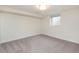 Basement bedroom with carpet and window at 350 Cherry St, Denver, CO 80220