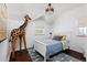 Spacious bedroom with a large inflatable giraffe and cheerful decor at 350 Cherry St, Denver, CO 80220