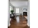 Bright dining room with dark hardwood floors, fireplace, and stylish furnishings at 350 Cherry St, Denver, CO 80220